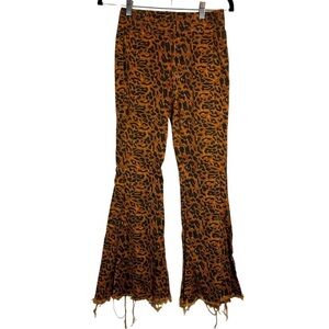 Turquoise Haven high rise distressed wide leg leopard print jeggings